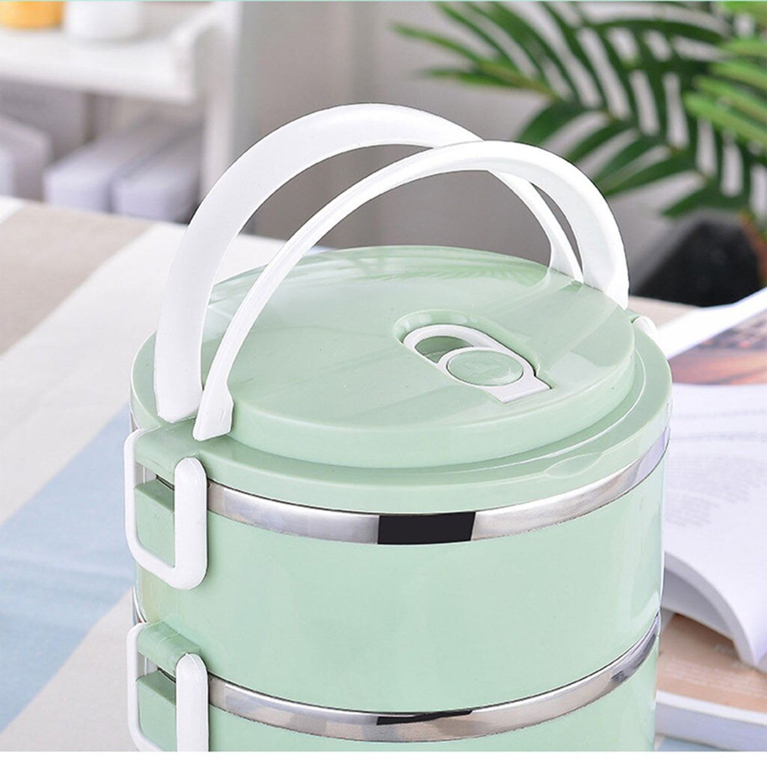 Four compartment stainless steel lunch box. Four compartment stainless steel lunch box.